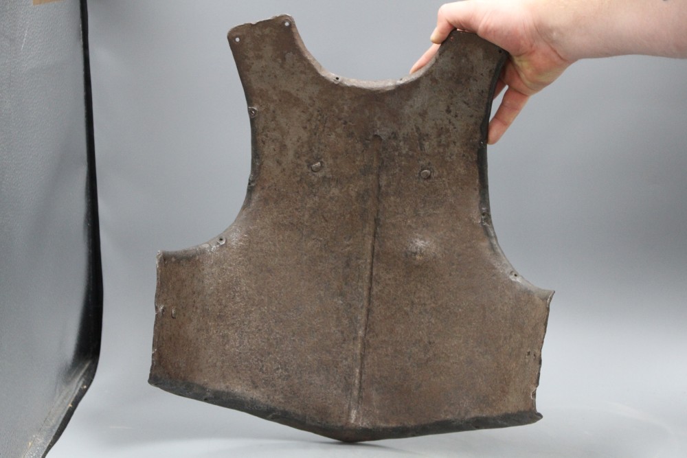 A heavy iron cavalry troopers breastplate, 17th century, struck twice with makers marks,